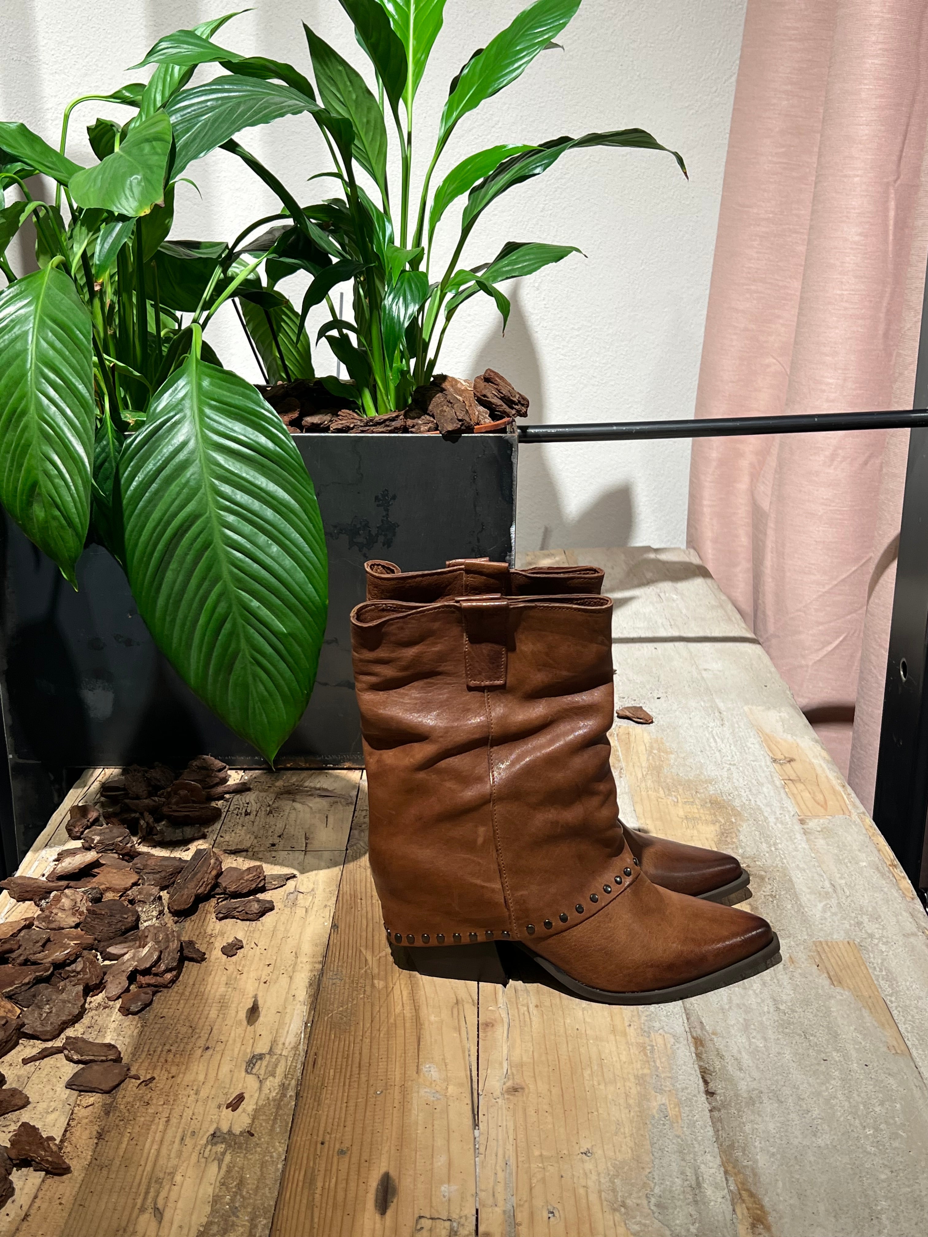 Texani pelle borchie cuoio